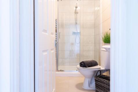 A modern, well-maintained bathroom featuring a ...