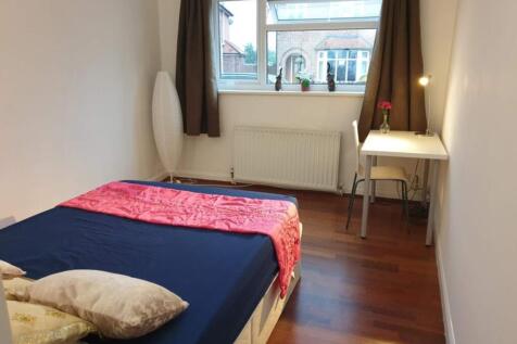 Bright and inviting double bedroom featuring a ...