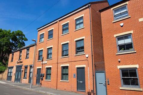 A well-maintained, modern red brick terraced pr...