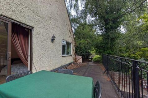 A serene outdoor garden terrace attached to the...