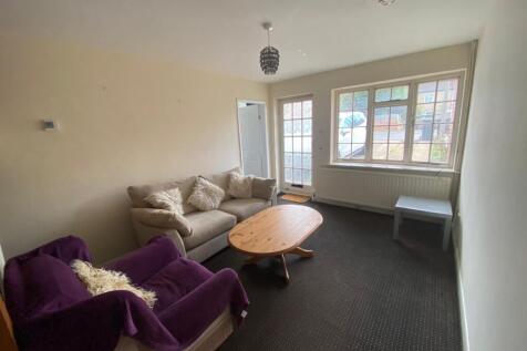 A cozy living room featuring comfortable seatin...