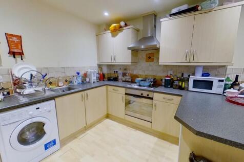 A practical and well-equipped kitchen featuring...