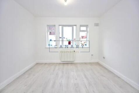 Bright and freshly decorated room with clean wh...