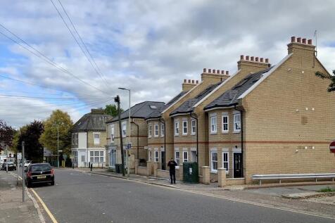 A well-maintained row of modern terraced houses...