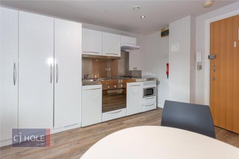 Bright and airy single bedroom featuring a mode...