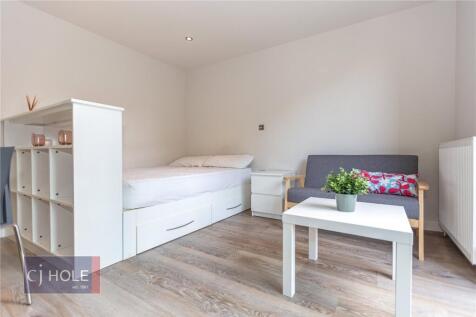 Bright and modern kitchen area featuring ample ...
