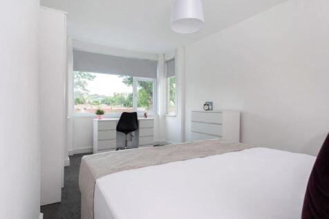 Bright and inviting double bedroom featuring a ...