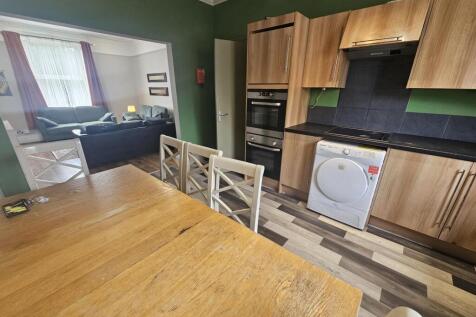 A bright and well-maintained kitchen featuring ...