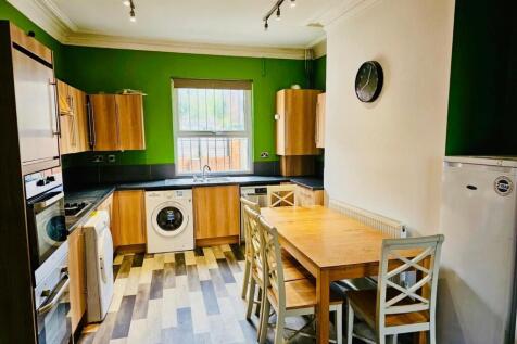 A bright and well-maintained kitchen featuring ...