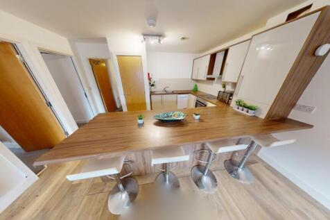 A modern, well-maintained kitchen featuring a s...