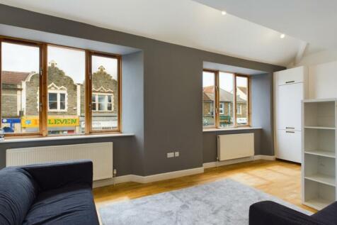 A spacious and bright modern living room with l...