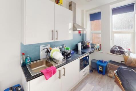 This well-appointed kitchen features modern app...