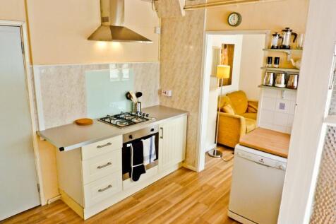 Bright and functional kitchen featuring modern ...