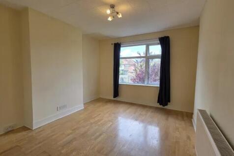 Bright and clean double bedroom featuring warm ...