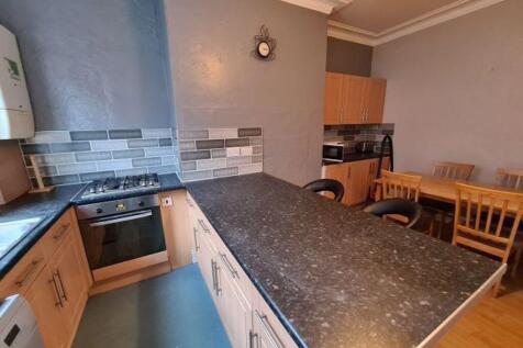 Bright and functional kitchen featuring a spaci...