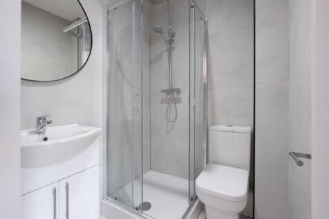 A modern and well-maintained bathroom featuring...