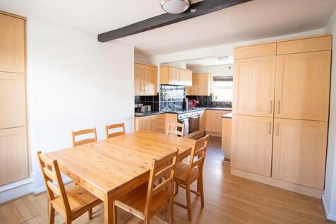 Bright and spacious kitchen featuring modern wo...