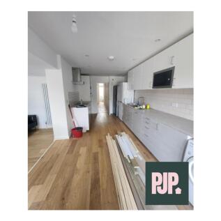 Spacious kitchen with modern appliances, ample ...