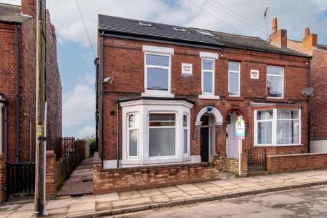 Charming front view of a welcoming property fea...