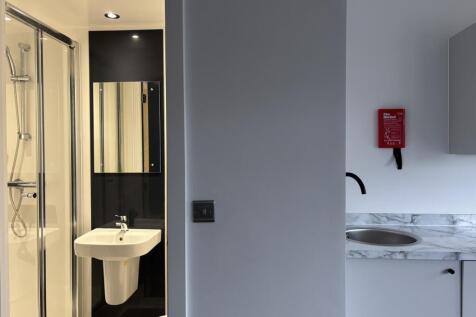 A modern and clean bathroom featuring stylish f...