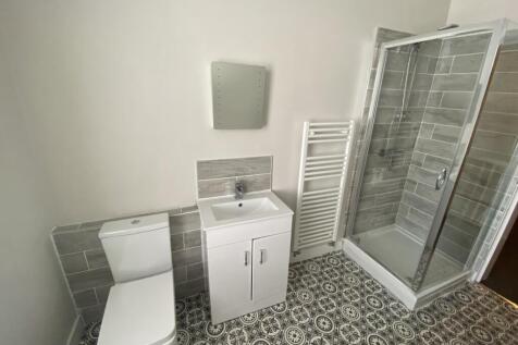 This modern bathroom features a sleek design wi...