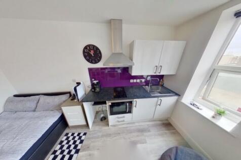 This charming kitchen area features modern appl...
