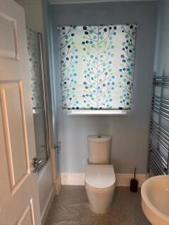 A clean and well-maintained bathroom with a mod...