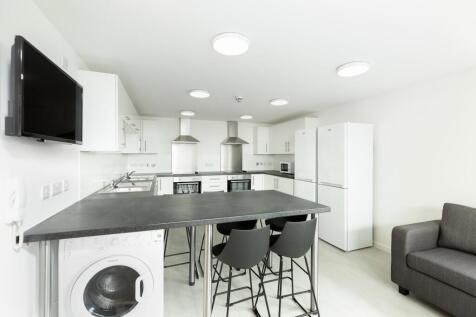 A modern and spacious kitchen, perfect for stud...