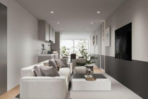 A spacious and stylish modern living room fille...