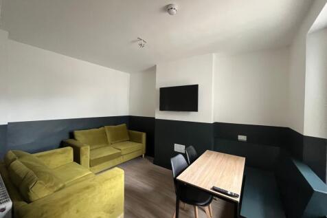A modern and inviting living room with comforta...