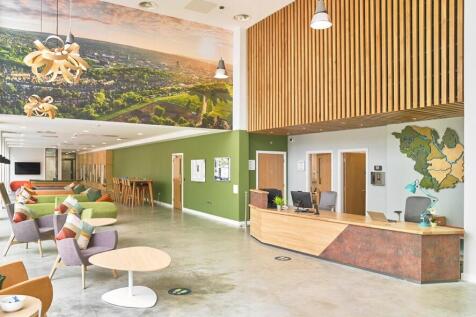 A spacious, modern reception area with stylish ...