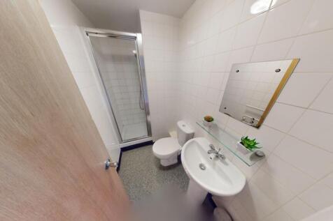 A neat and well-maintained bathroom featuring a...