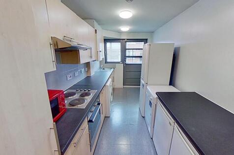 Bright and functional kitchen equipped with mod...