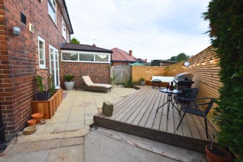 A charming and well-maintained outdoor garden s...