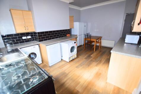 Bright and well-maintained kitchen featuring mo...