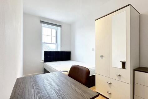 Bright and inviting double bedroom featuring a ...