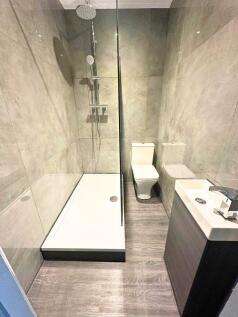 A modern and well-maintained bathroom featuring...