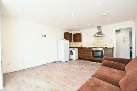 Bright and clean open-plan living room with mod...