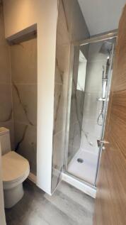 A modern and well-maintained bathroom featuring...