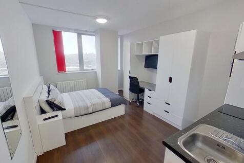 Bright and modern double bedroom featuring a co...