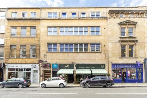 A well-maintained street view of a charming ter...