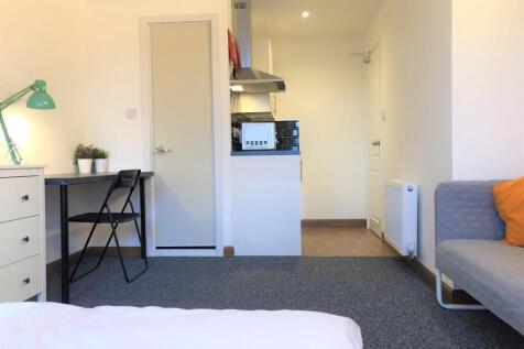 Bright and tidy single bedroom featuring a stud...