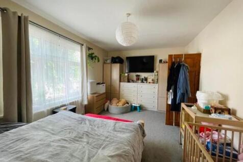 Bright and inviting master bedroom featuring a ...