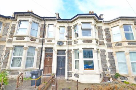 A charming terraced house with classic bay wind...