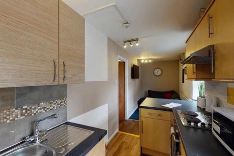 A neat and well-maintained kitchen featuring mo...
