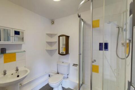 Bright and clean bathroom featuring a modern co...