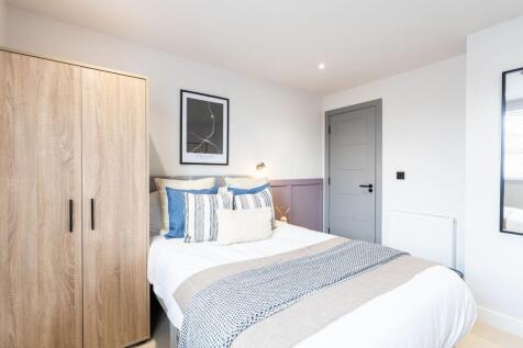 Bright and inviting double bedroom featuring a ...