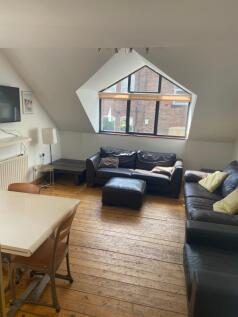 A bright and inviting double bedroom featuring ...