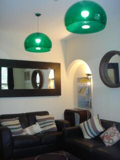 A stylish and spacious modern living room with ...