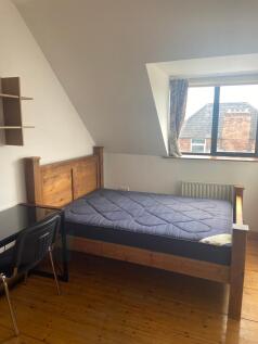 A bright and inviting kitchenette with ample sp...